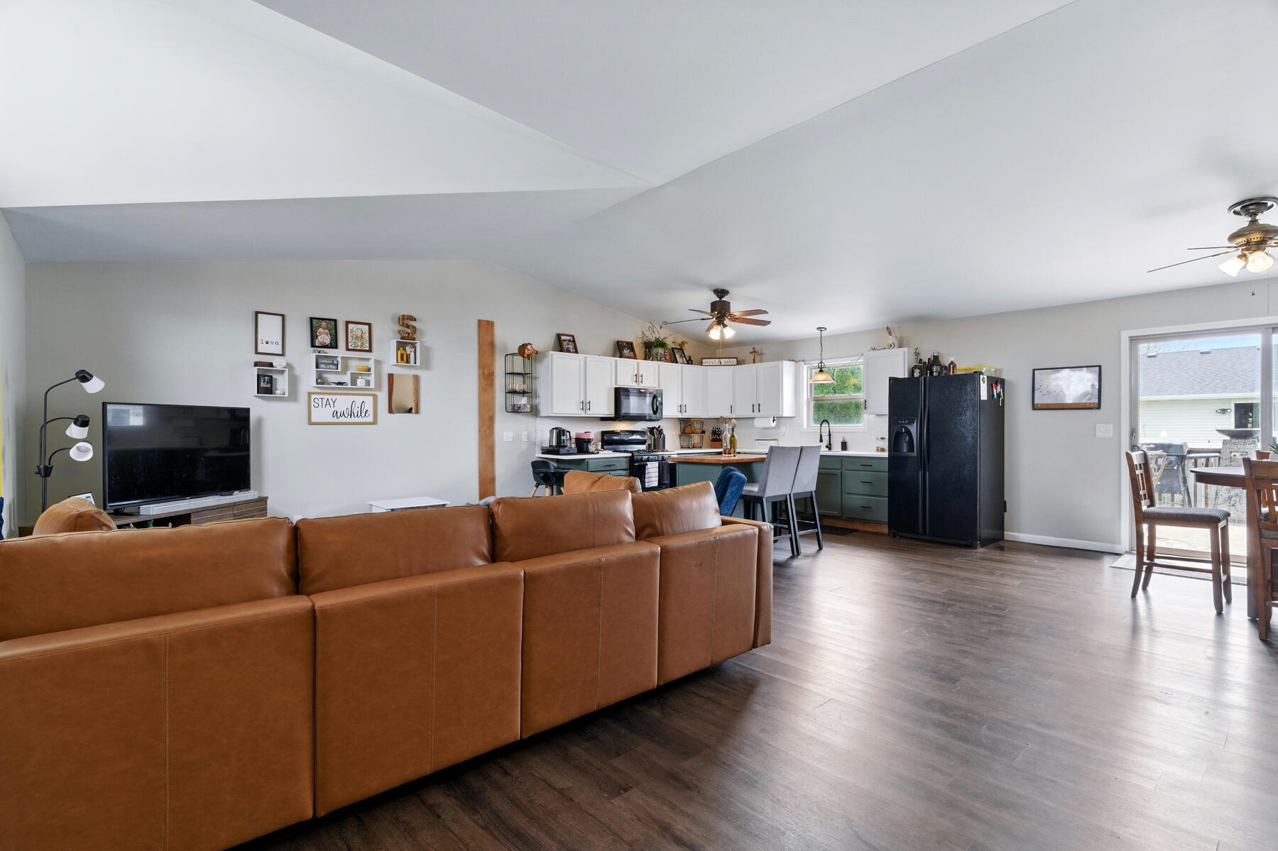 Empty living room before virtual staging — unfurnished space with bare walls and flooring